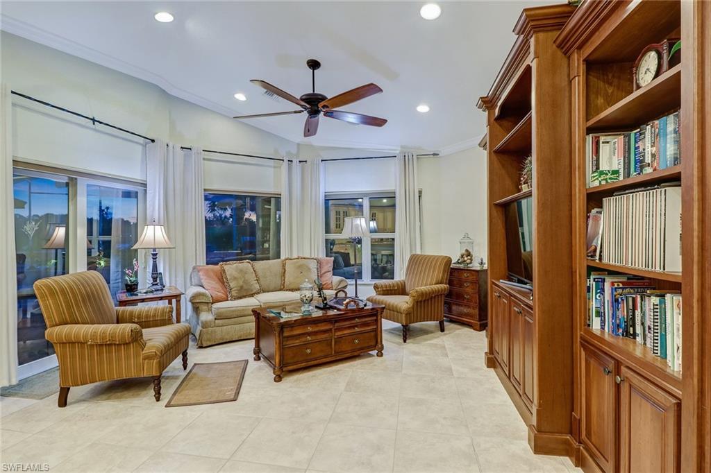 19731 Villa Rosa Loop Estero, FL 33967 - Photo 7 of 27 a living room with furniture a ceiling fan and a rug