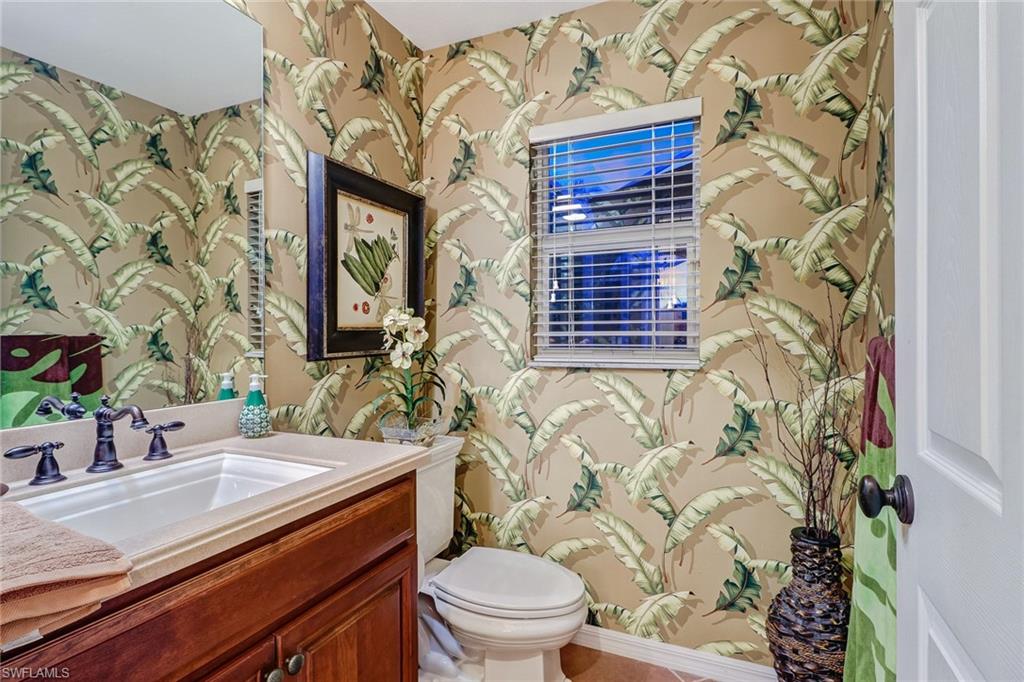 19731 Villa Rosa Loop Estero, FL 33967 - Photo 9 of 27 a bathroom with a sink toilet and shower