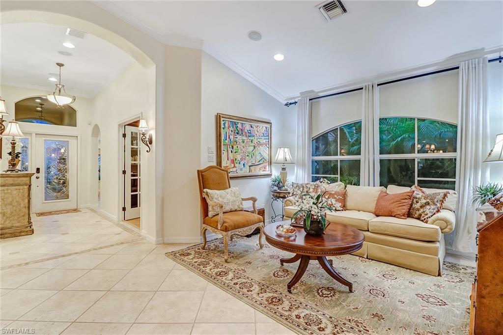 19731 Villa Rosa Loop Estero, FL 33967 - Photo 10 of 27 a living room with furniture and a large window