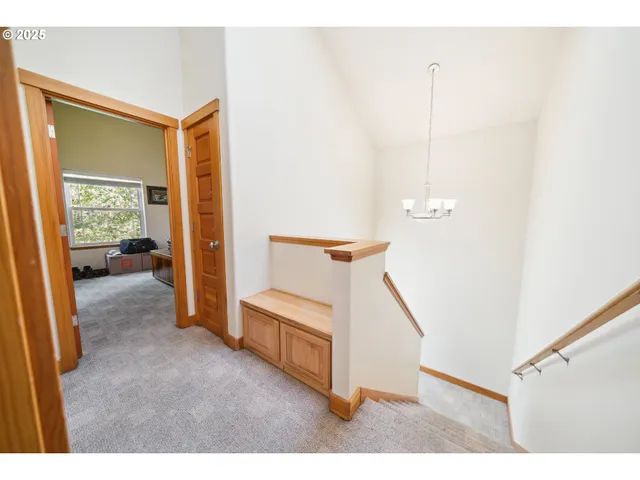 a view of a hallway with front door