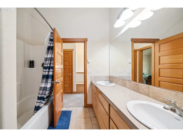 a bathroom with a sink a vanity and a mirror