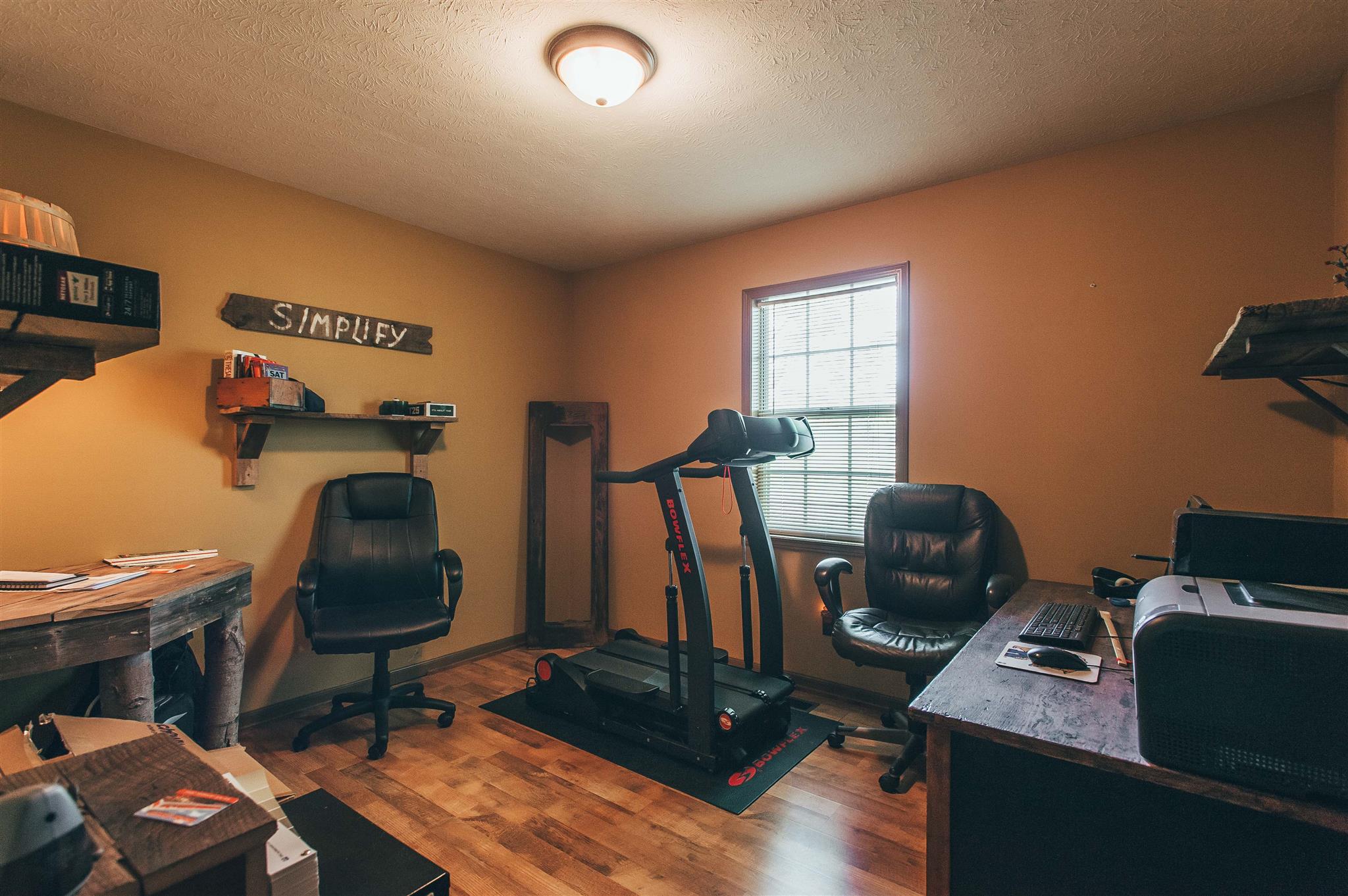1253 Smith Thompson Road Bethpage, TN 37022 - Photo 4 of 19 a work room with furniture and gym equipment
