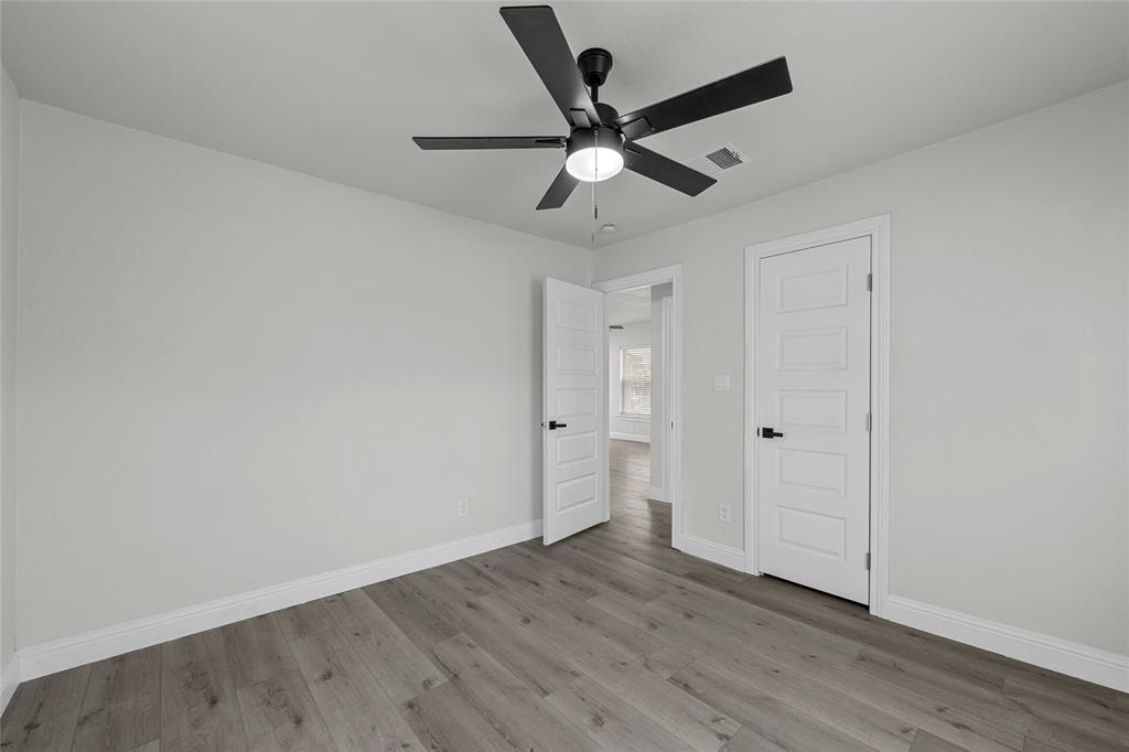 3530 Bluebird Street Bellmead, TX 76705 - Photo 16 of 24 wooden floor in an empty room