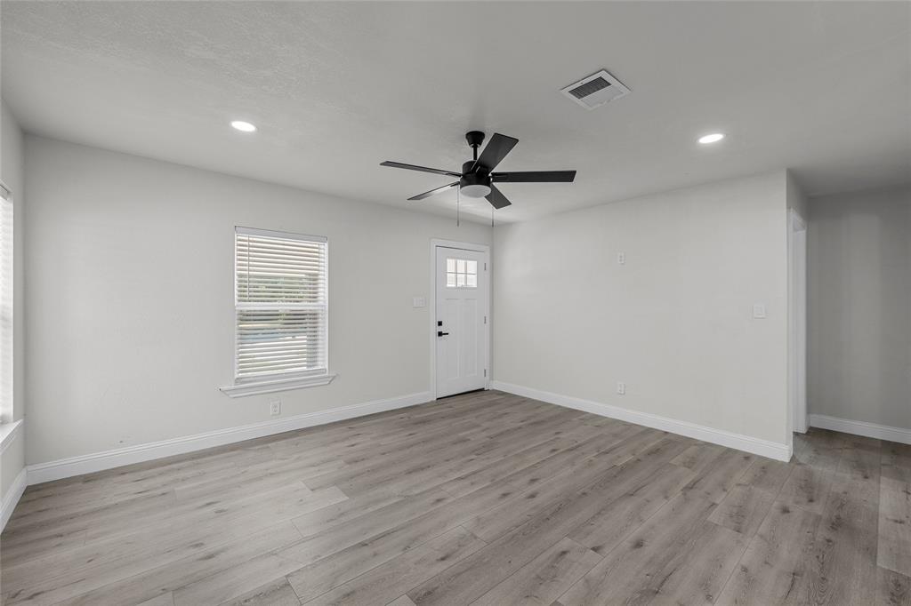 3530 Bluebird Street Bellmead, TX 76705 - Photo 2 of 24 a view of an empty room with a window