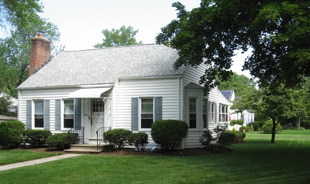 34 Mayflower Road Springfield, MA 01118 - Photo 3 of 23 a front view of a house with a yard and outdoor seating