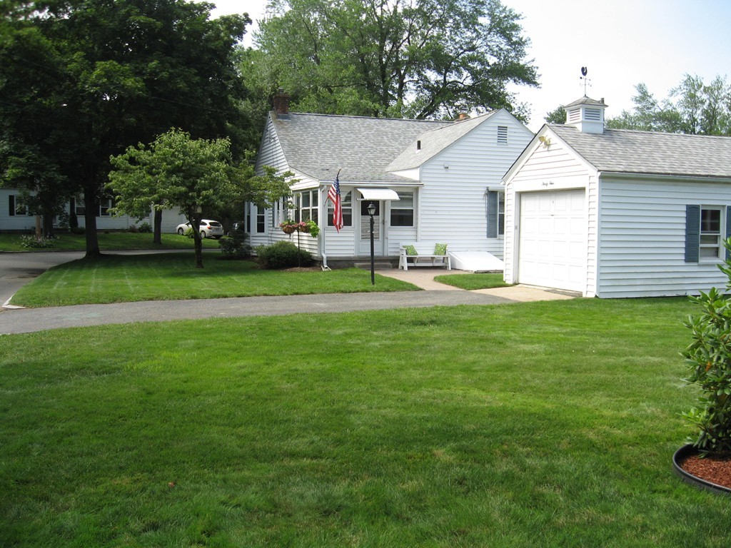 34 Mayflower Road Springfield, MA 01118 - Photo 5 of 23 a house view with a outdoor space
