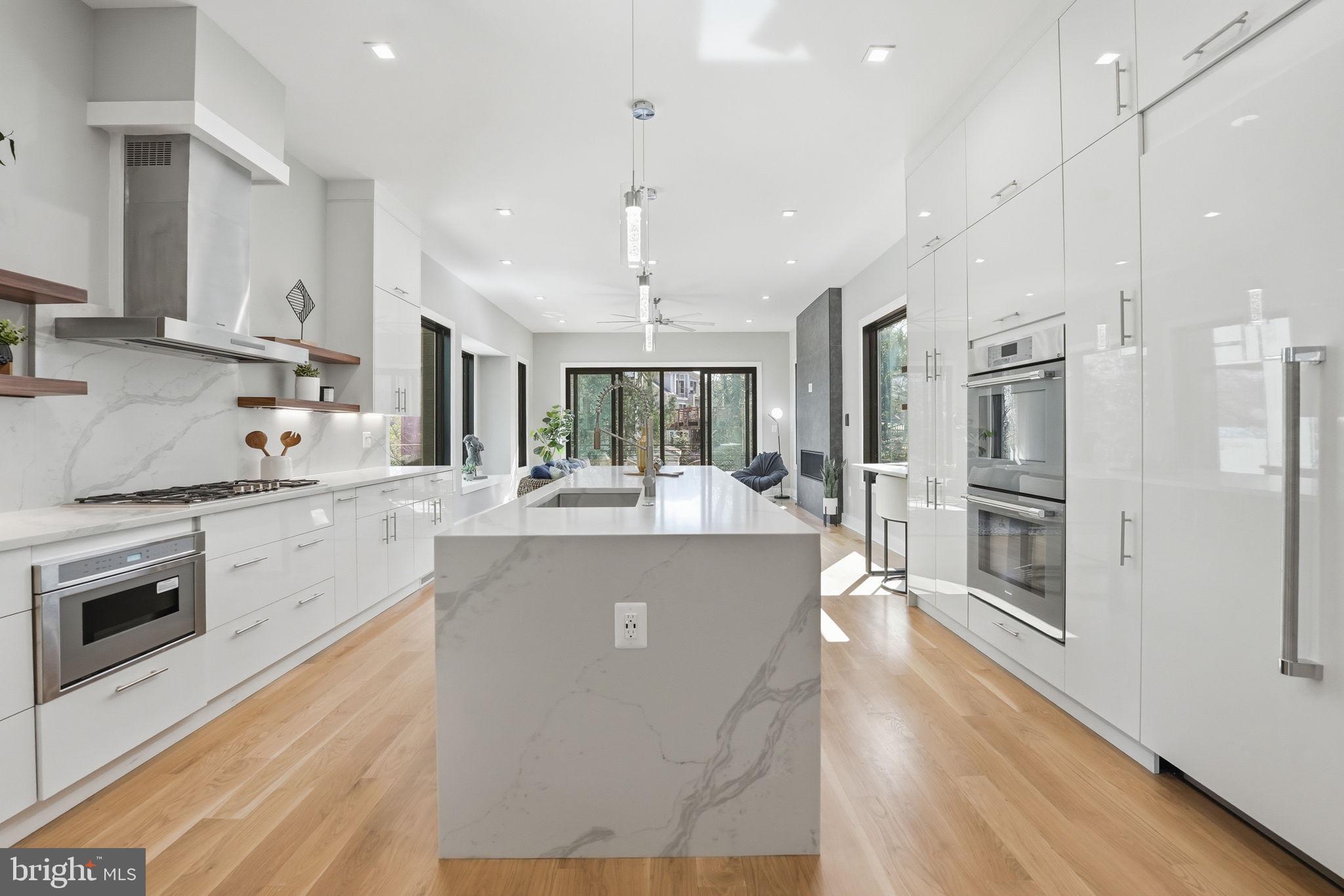 2211 Military Road Arlington, VA 22207 - Photo 17 of 107 Sleek modern kitchen with natural light.