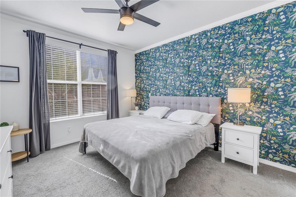 4221 West Spruce Street, Unit 1325 Tampa, FL 33607 - Photo 16 of 35 a bedroom with a bed and a window