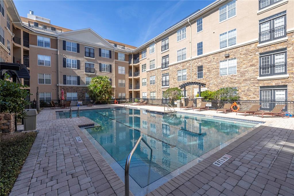 4221 West Spruce Street, Unit 1325 Tampa, FL 33607 - Photo 27 of 35 a view of pool with outdoor seating