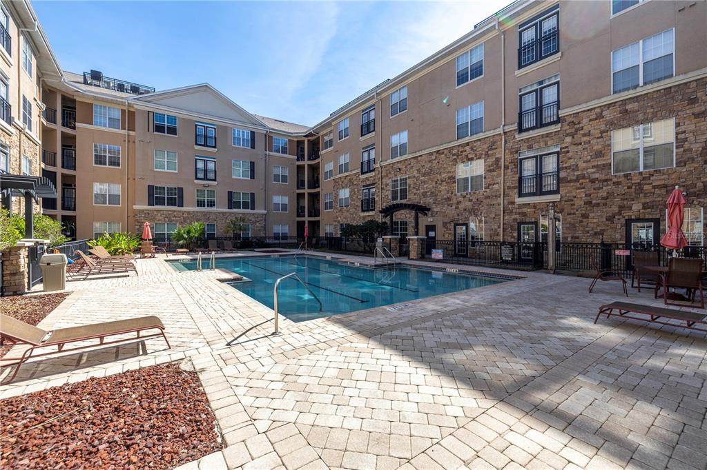 4221 West Spruce Street, Unit 1325 Tampa, FL 33607 - Photo 29 of 35 a view of a building with a yard