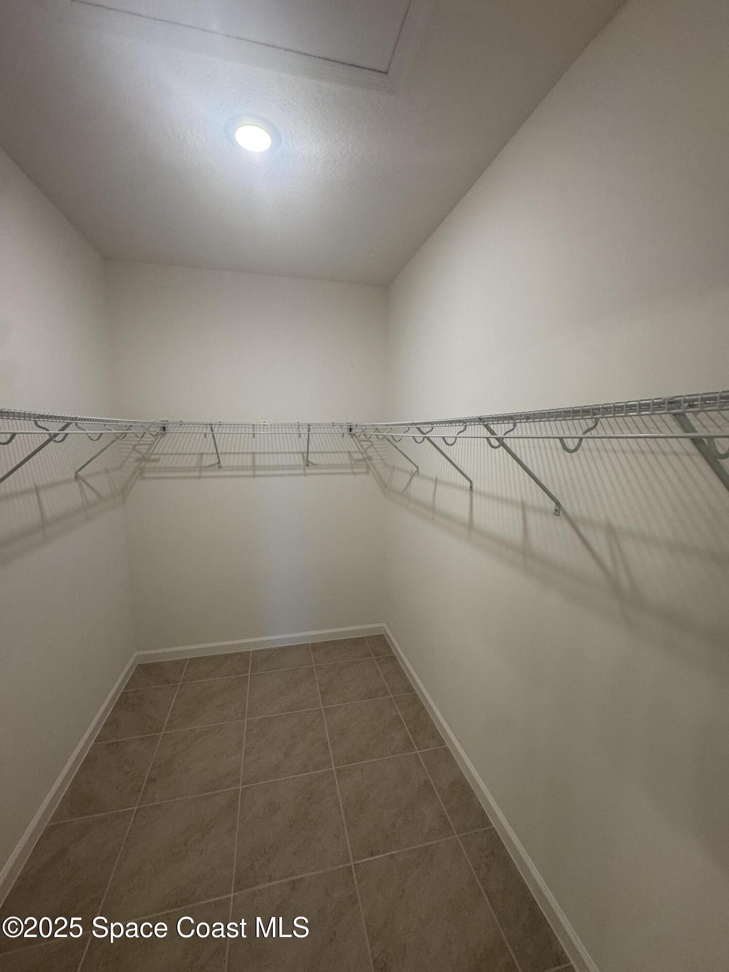 1041 Canfield Circle Palm Bay, FL 32909 - Photo 19 of 57 20250402_131541864_iOS