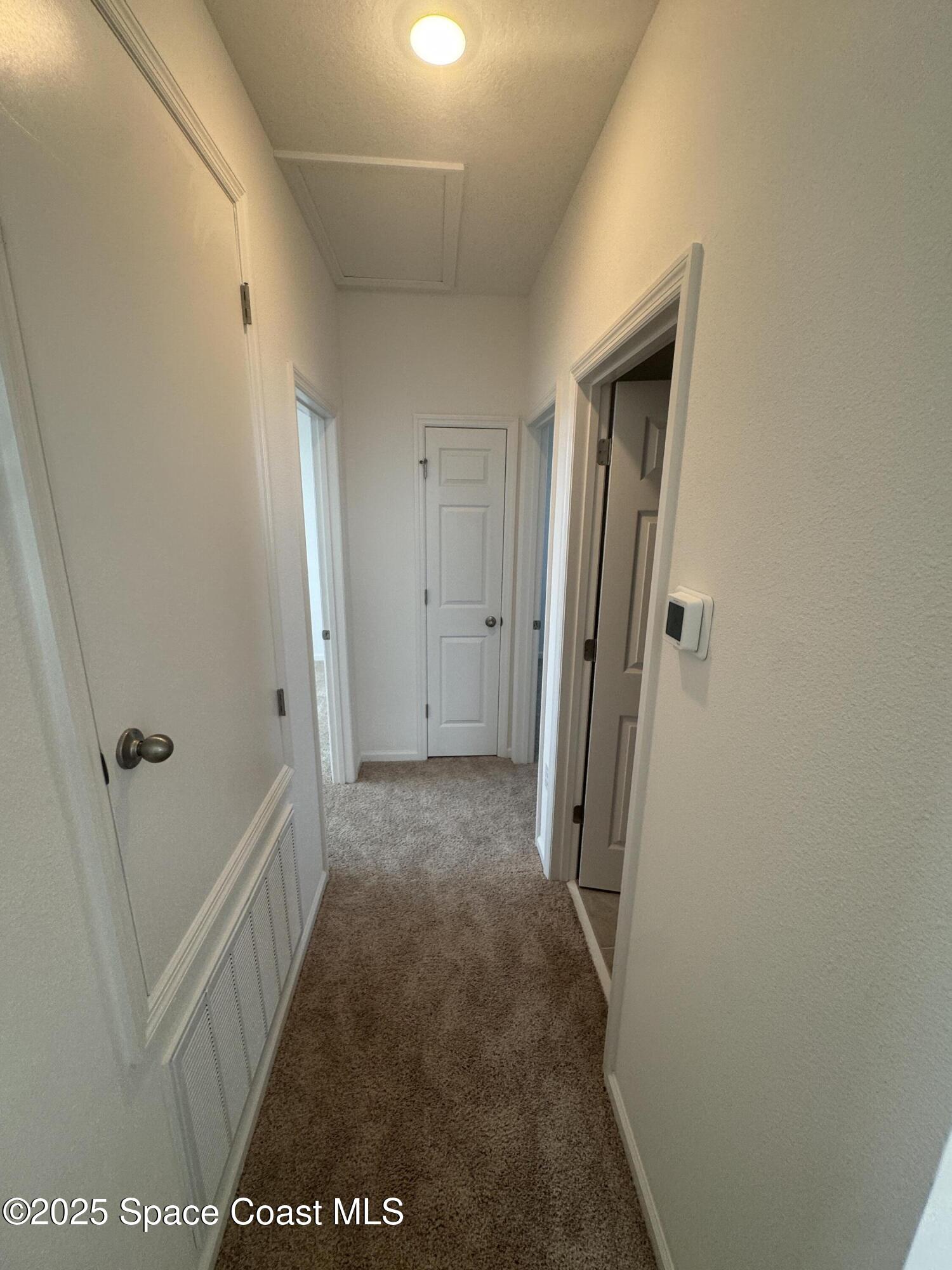 1041 Canfield Circle Palm Bay, FL 32909 - Photo 30 of 57 a view of a hallway
