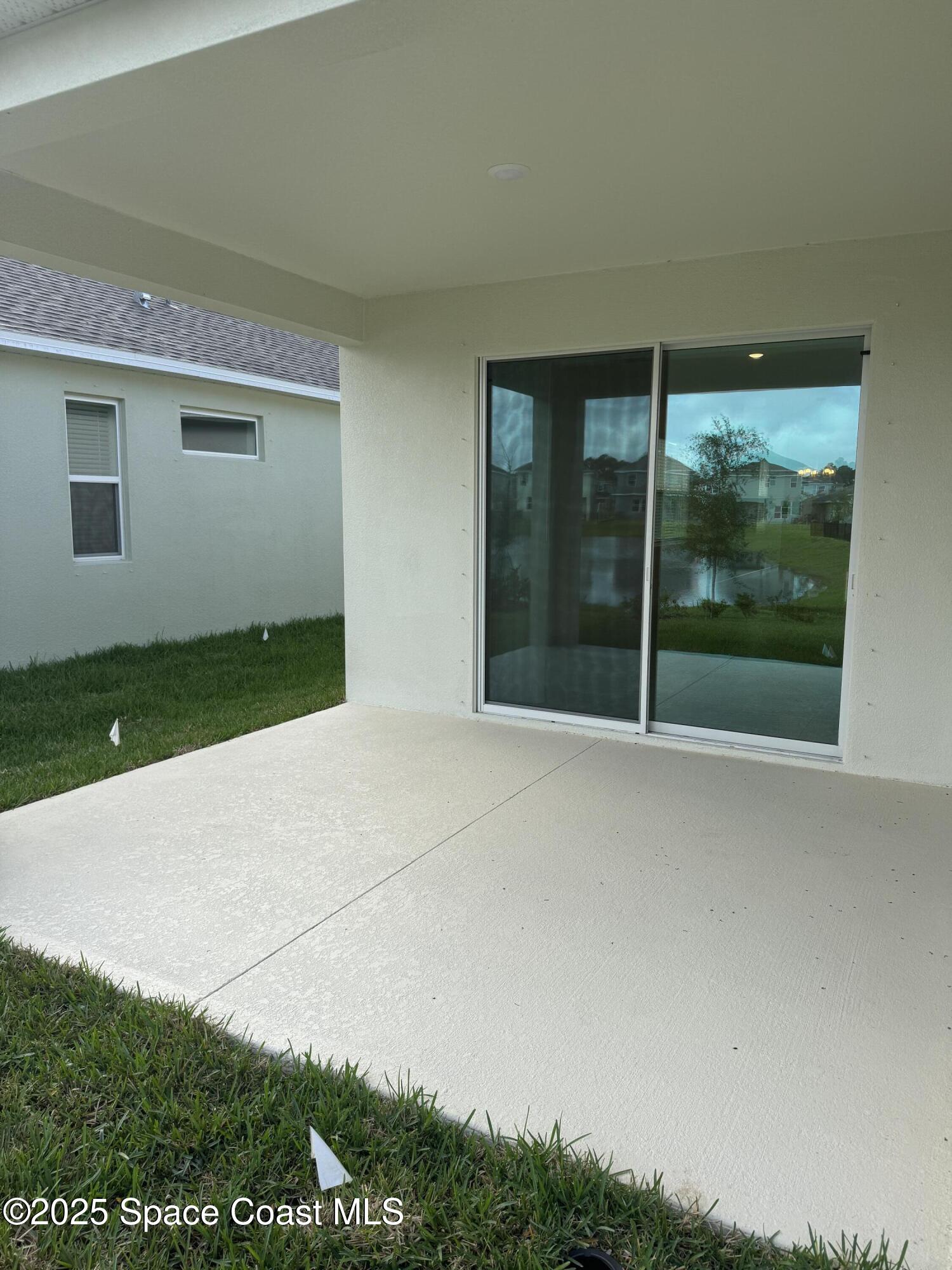 1041 Canfield Circle Palm Bay, FL 32909 - Photo 45 of 57 a view of backyard with green space