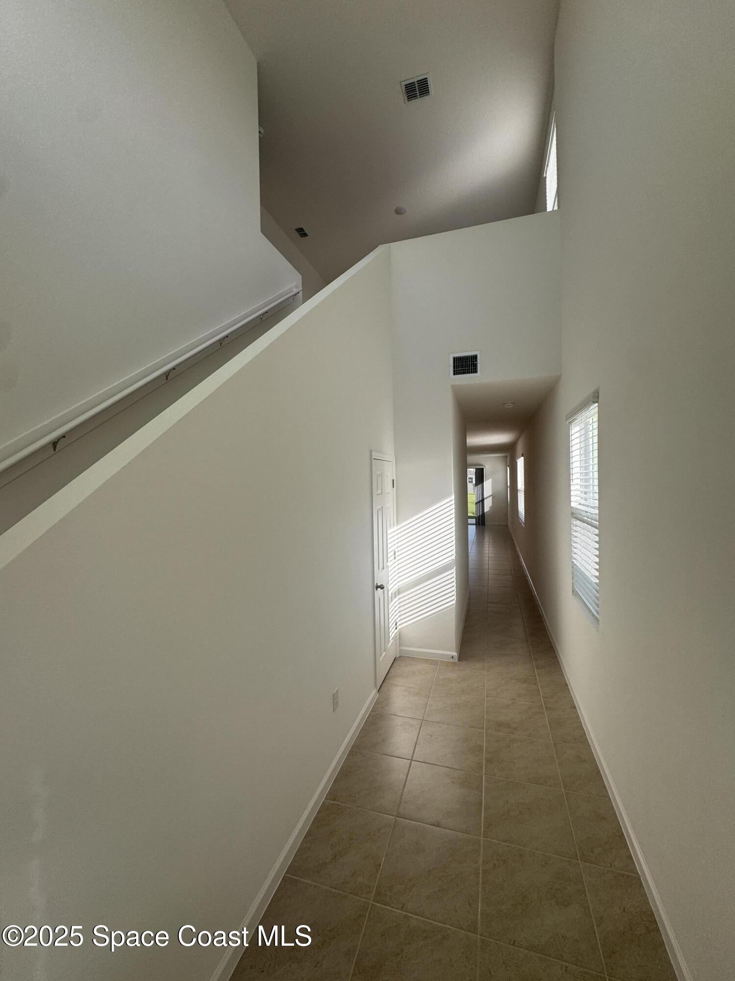 1041 Canfield Circle Palm Bay, FL 32909 - Photo 5 of 57 a view of hallway with stairs