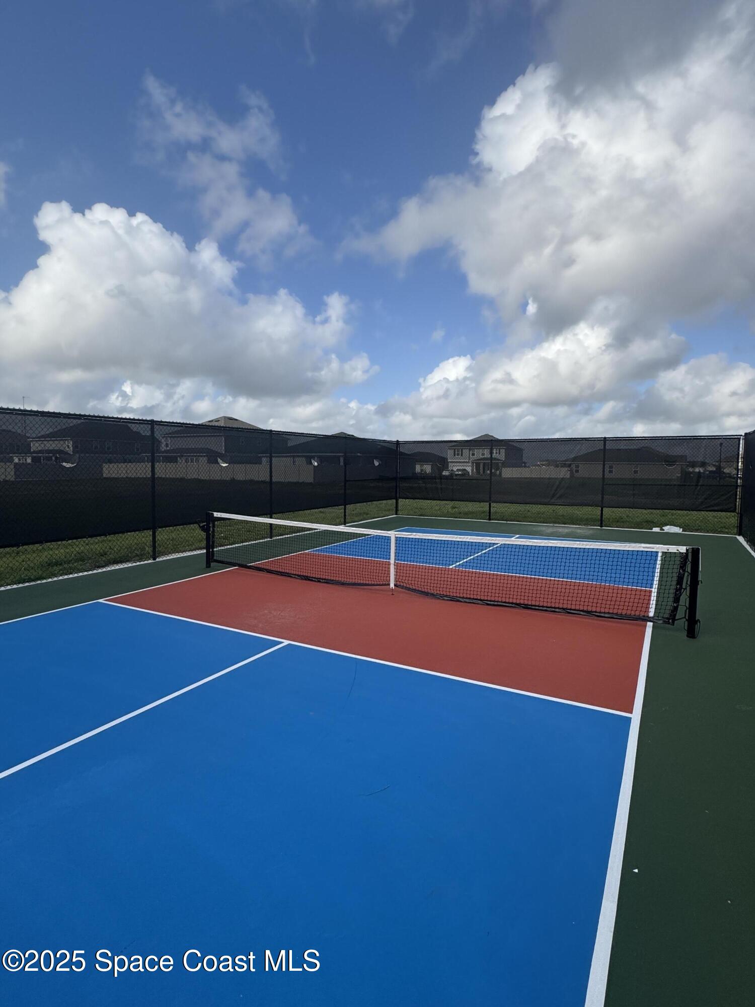 1041 Canfield Circle Palm Bay, FL 32909 - Photo 56 of 57 a view of swimming pool with an outdoor space and seating area