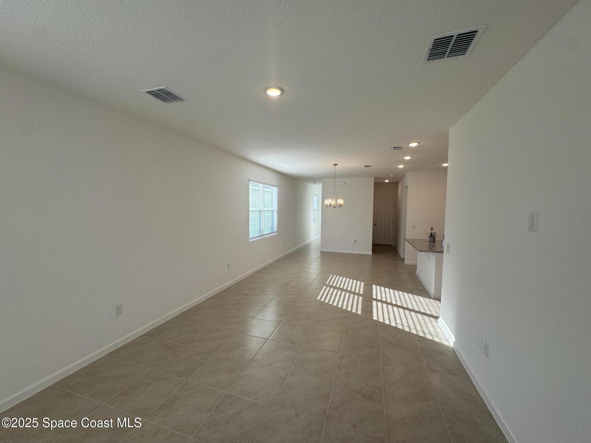 1041 Canfield Circle Palm Bay, FL 32909 - Photo 8 of 57 a view of a hallway