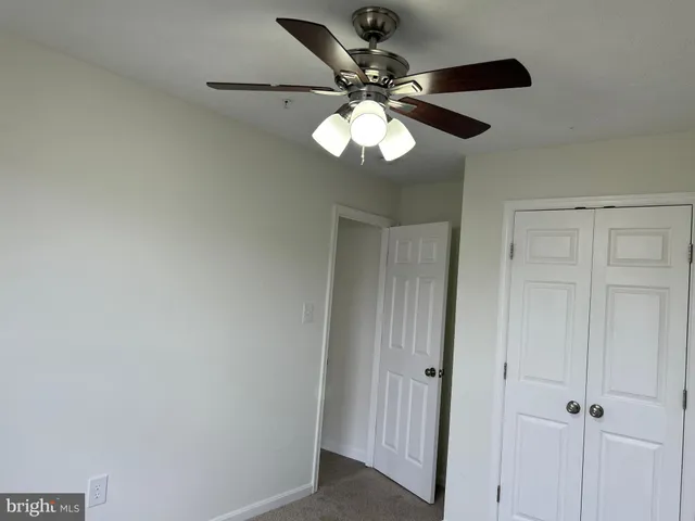 a view of a chandelier fan and a chandelier fan