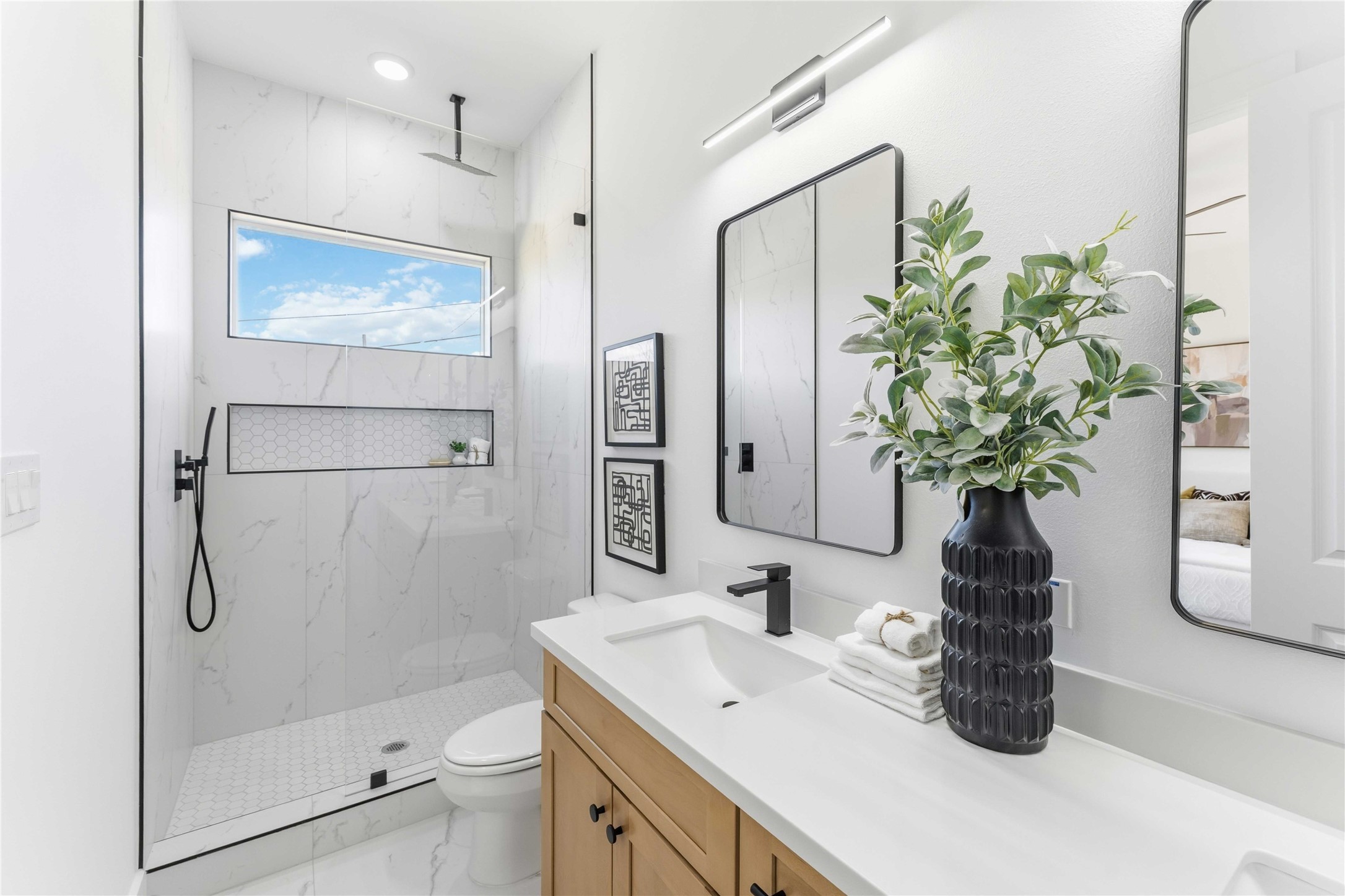 5423 Manton Street, Unit AB Houston, TX 77028 - Photo 21 of 25 a bathroom with a sink a toilet and shower