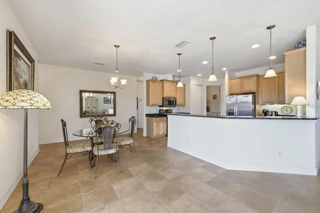 a view of a park with swings and slides