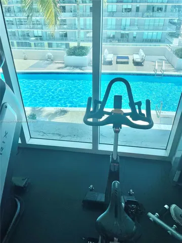 a bathroom with a tub and a shower