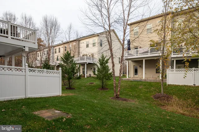 a view of house with yard