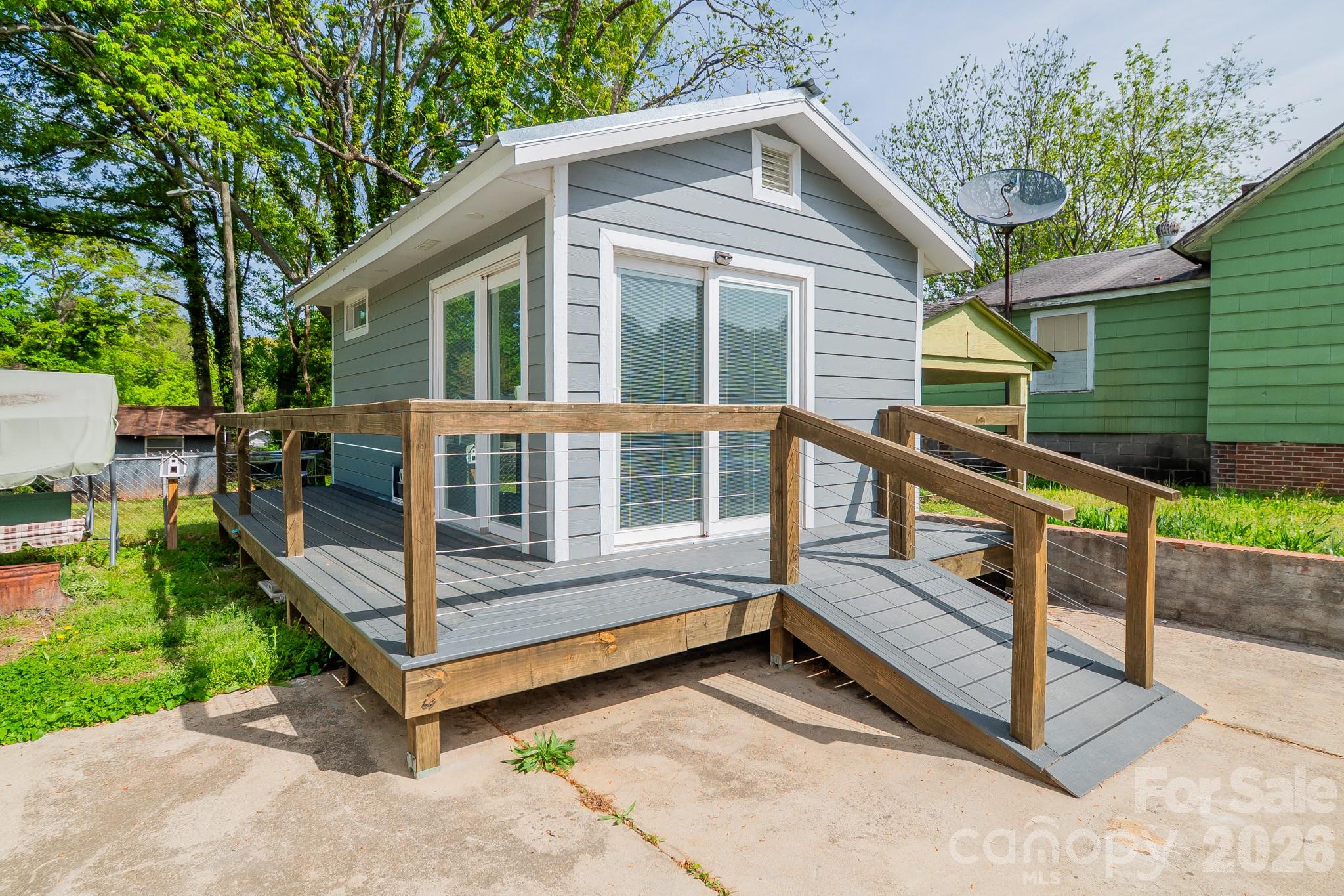 306 Ridge Street Stanley, NC 28164 - Photo 27 of 44 a view of a house with backyard and porch