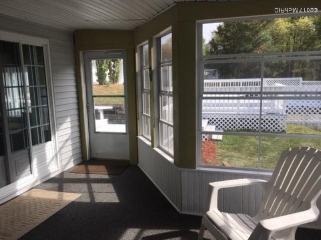7544 Eldred Road Crystal, MI 48818 - Photo 23 of 27 Three seasons porch and pool