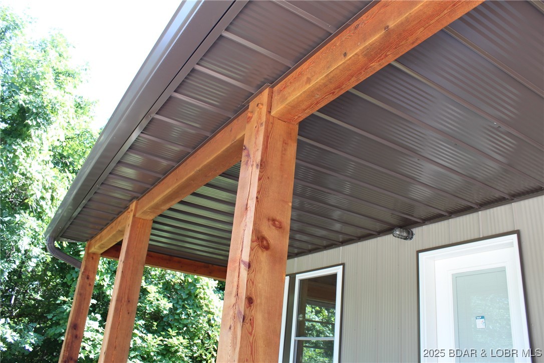 28511 Cody Road Stover, MO 65078 - Photo 12 of 26 Craftsman style doweled joints in front porch deta