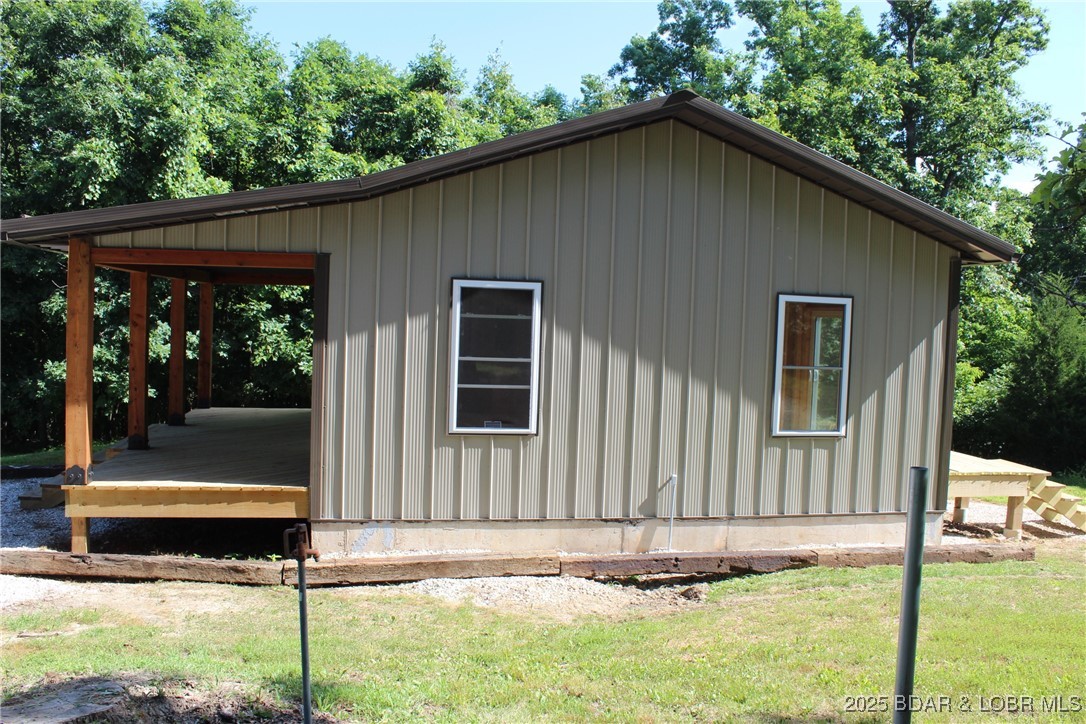 28511 Cody Road Stover, MO 65078 - Photo 9 of 26 south exposure with water hydrant