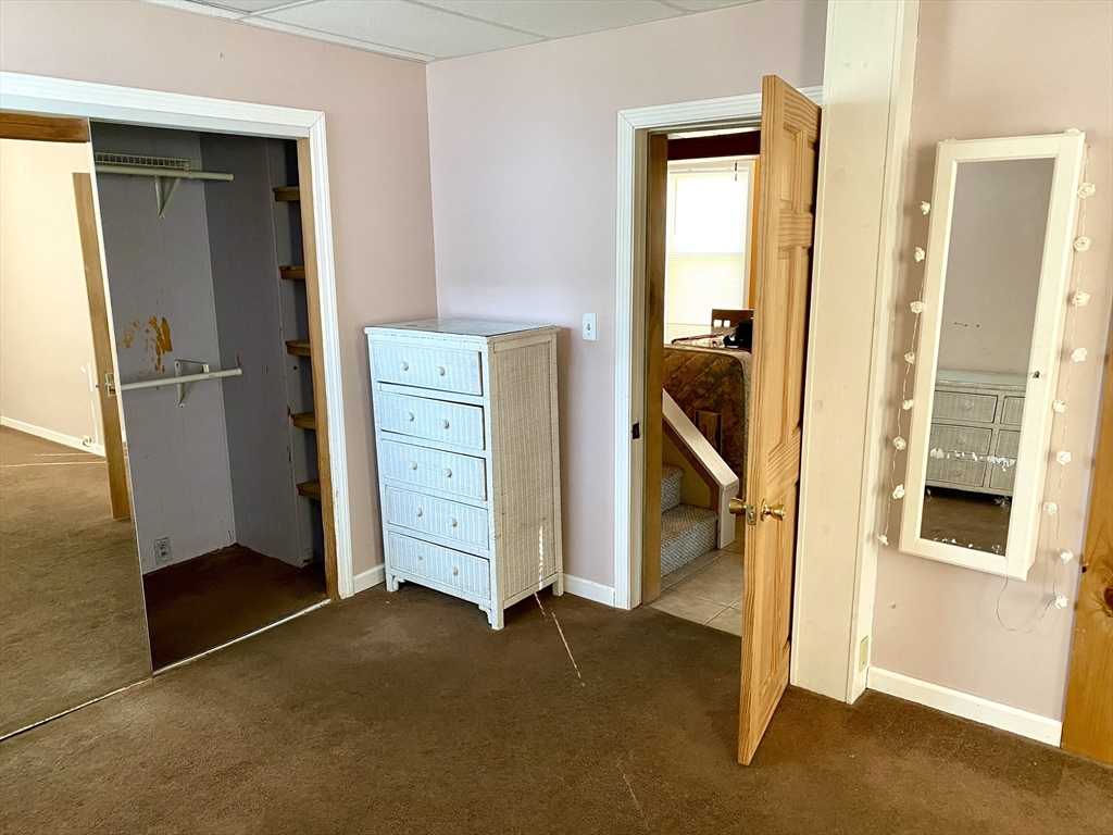 13 Deane Street Fairhaven, MA 02719 - Photo 19 of 28 a view of an empty room with a fireplace