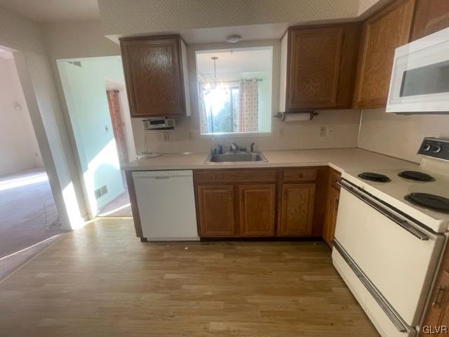 1201 Butztown Road, Unit 17 Bethlehem, PA 18017 - Photo 8 of 15 a kitchen with stainless steel appliances granite countertop a sink stove and refrigerator