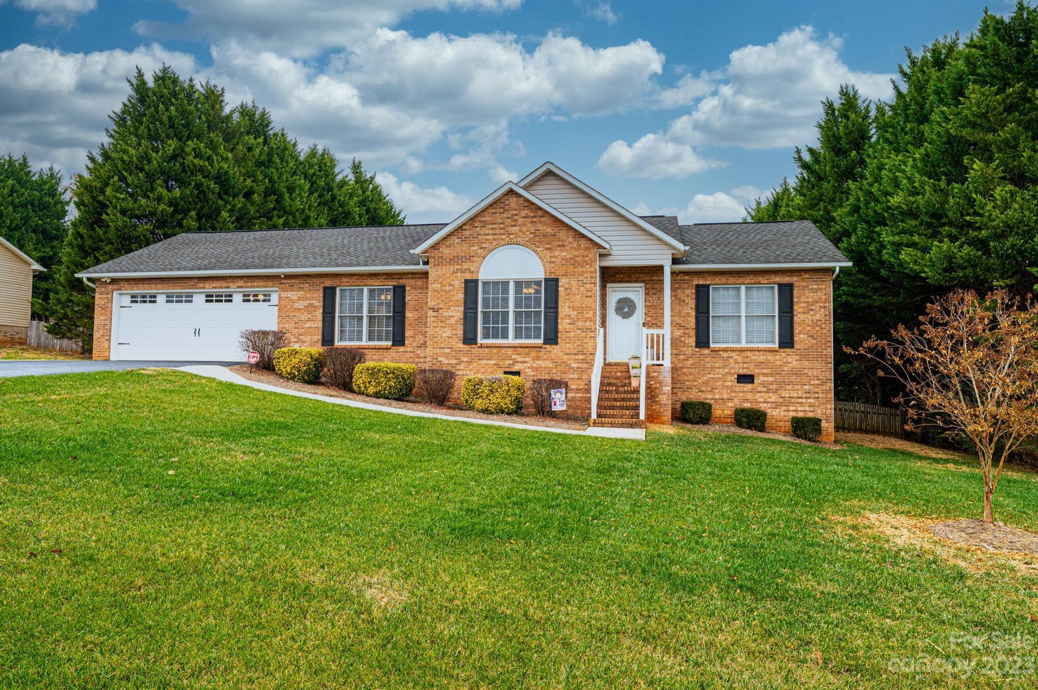 4875 Water Wheel Drive Conover, NC 28613 - Photo 1 of 33 a front view of house with yard and green space
