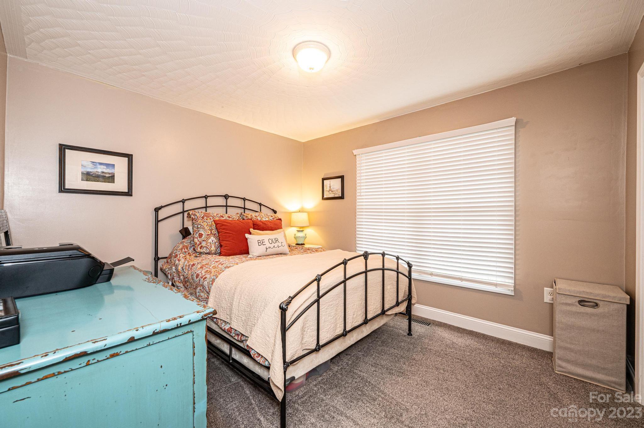 4875 Water Wheel Drive Conover, NC 28613 - Photo 18 of 33 a bedroom with a bed and a window