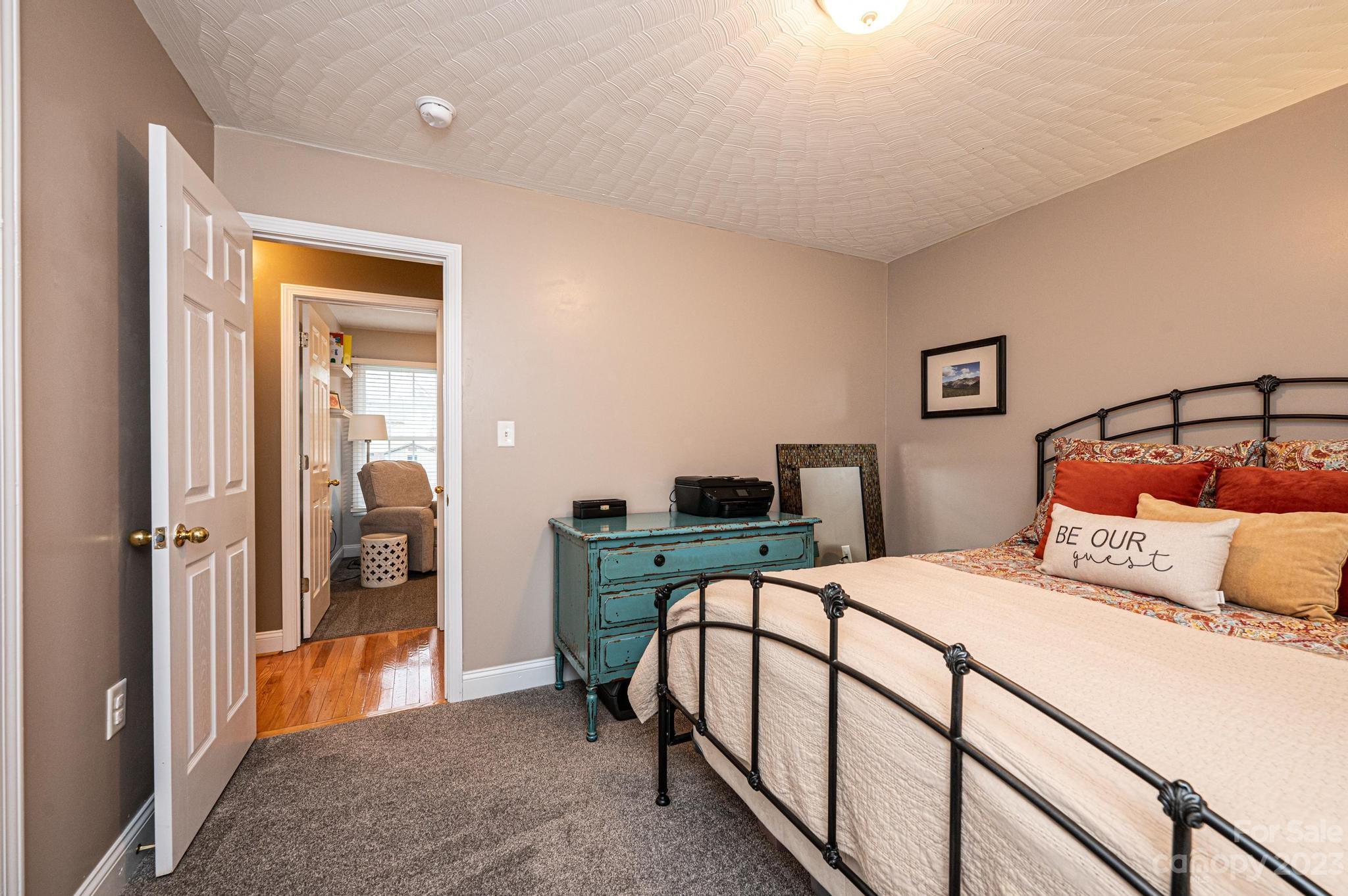 4875 Water Wheel Drive Conover, NC 28613 - Photo 19 of 33 a bedroom with a bed and a table