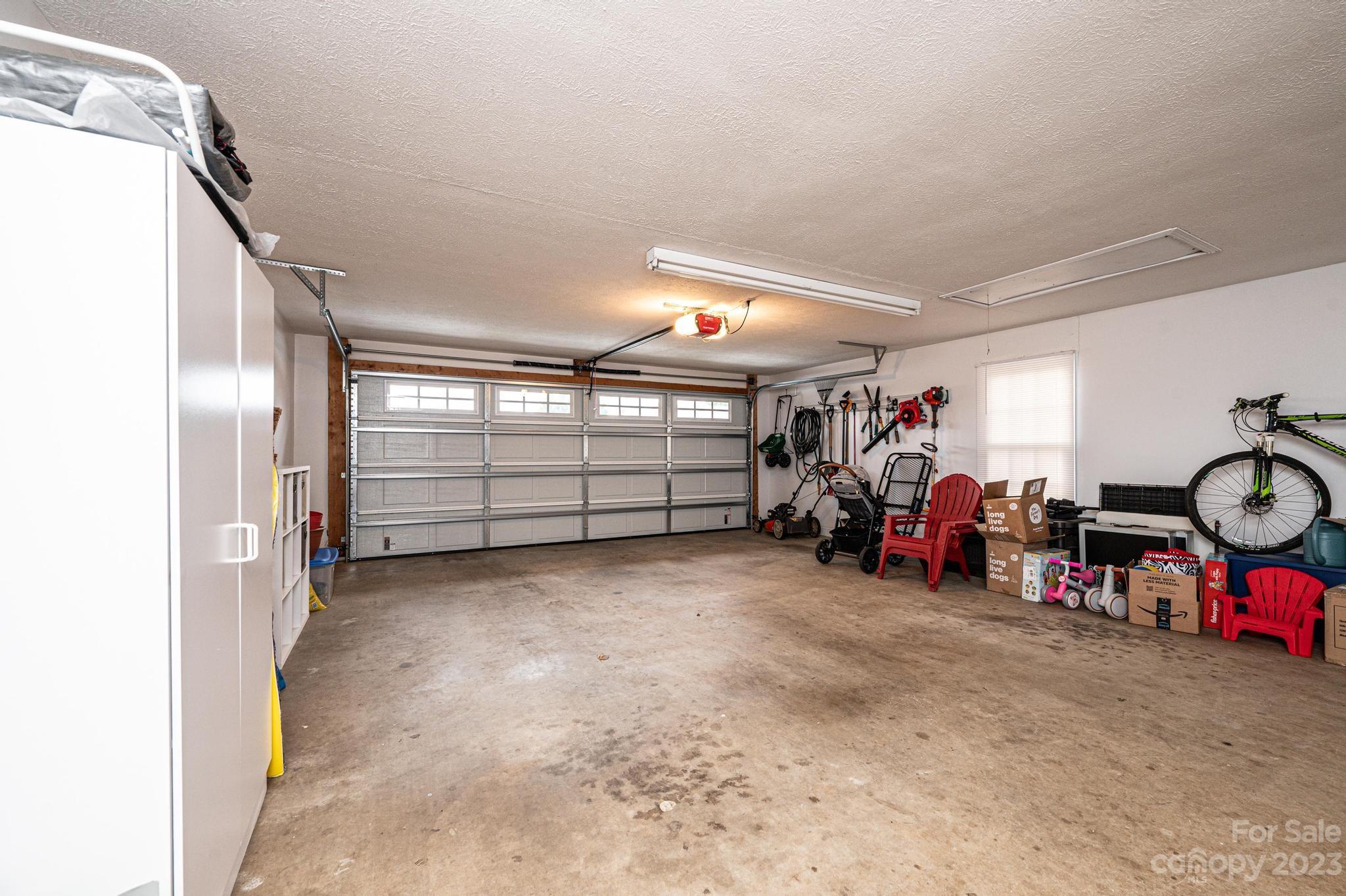 4875 Water Wheel Drive Conover, NC 28613 - Photo 30 of 33 a view of a garage with rack and bicycle