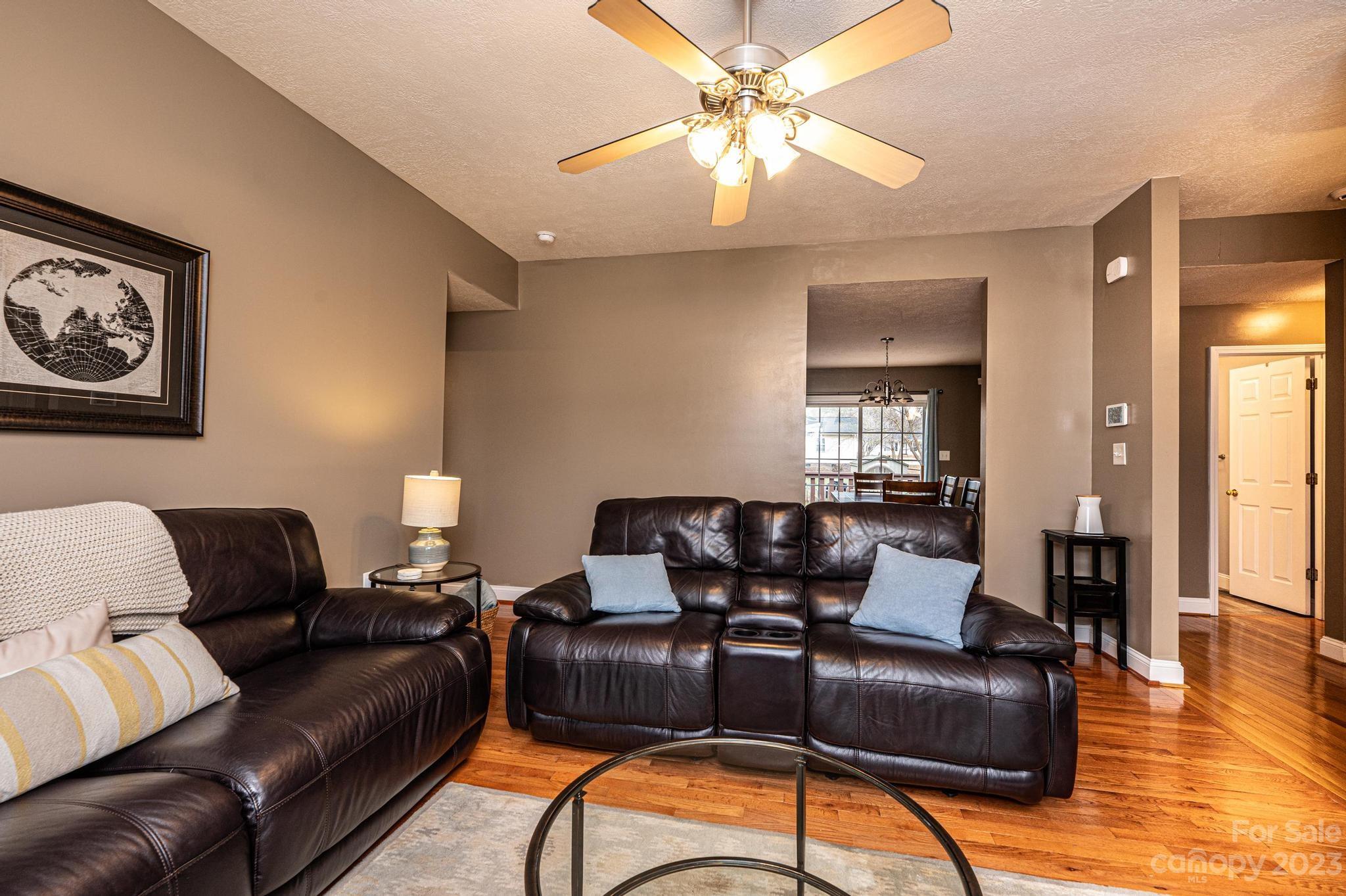 4875 Water Wheel Drive Conover, NC 28613 - Photo 6 of 33 a living room with furniture and a wooden floor