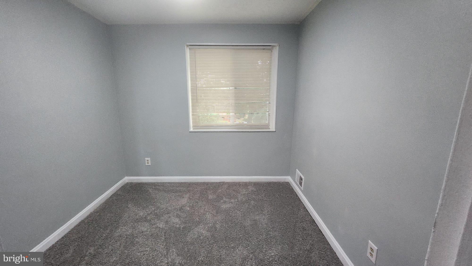 3914 28th Avenue Temple Hills, MD 20748 - Photo 12 of 28 an empty room with a window