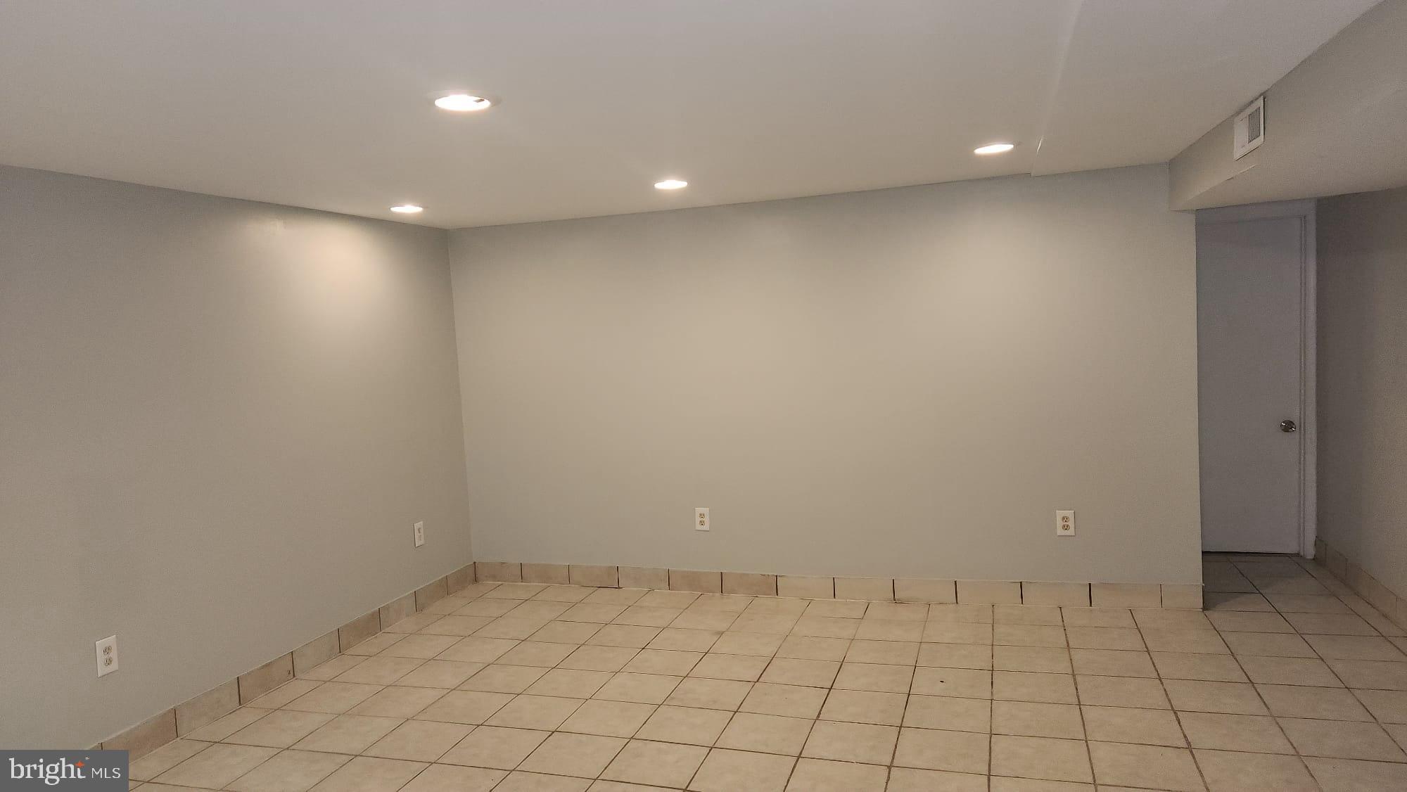 3914 28th Avenue Temple Hills, MD 20748 - Photo 14 of 28 a view of an empty room