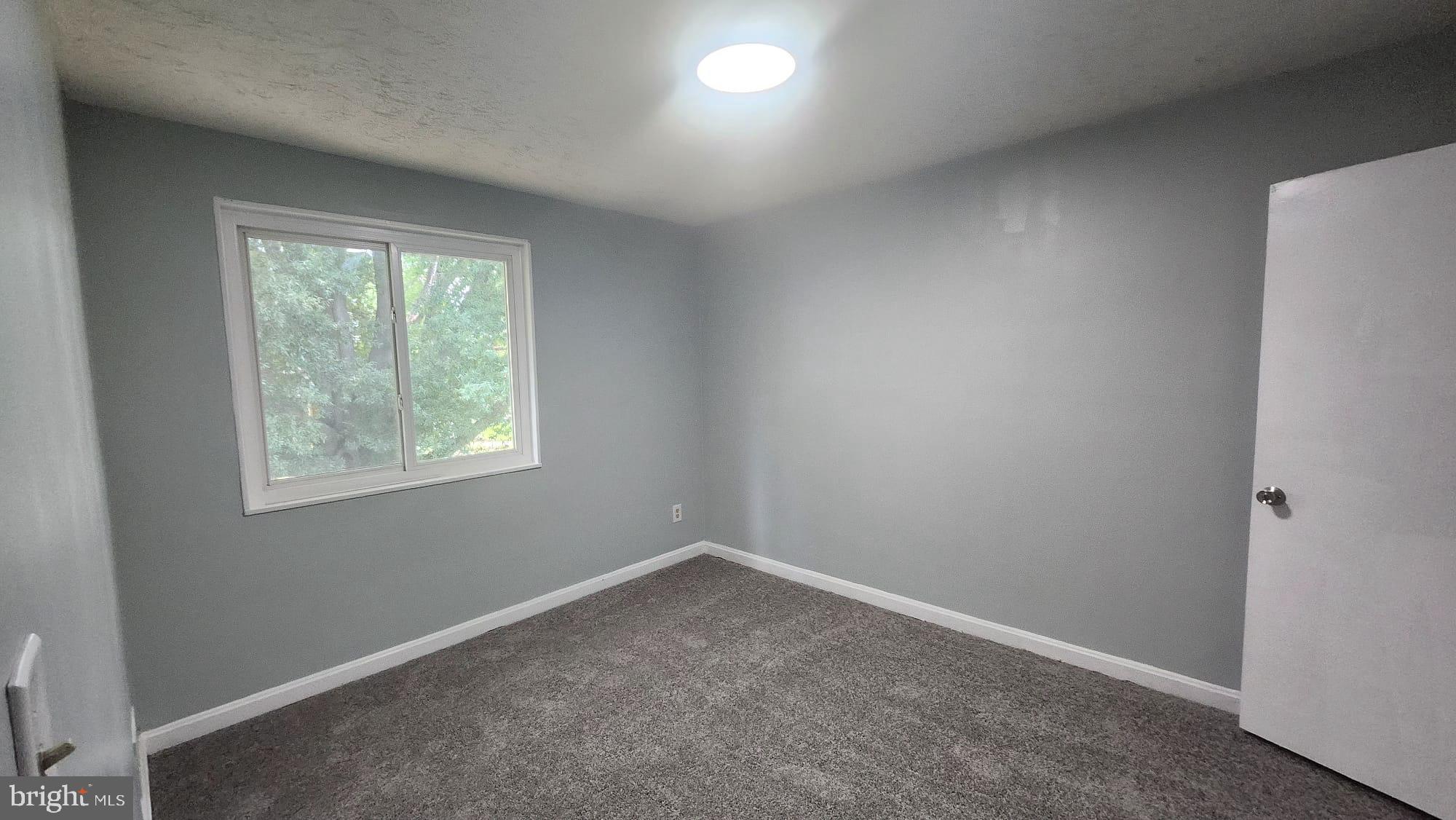 3914 28th Avenue Temple Hills, MD 20748 - Photo 6 of 28 an empty room with a window