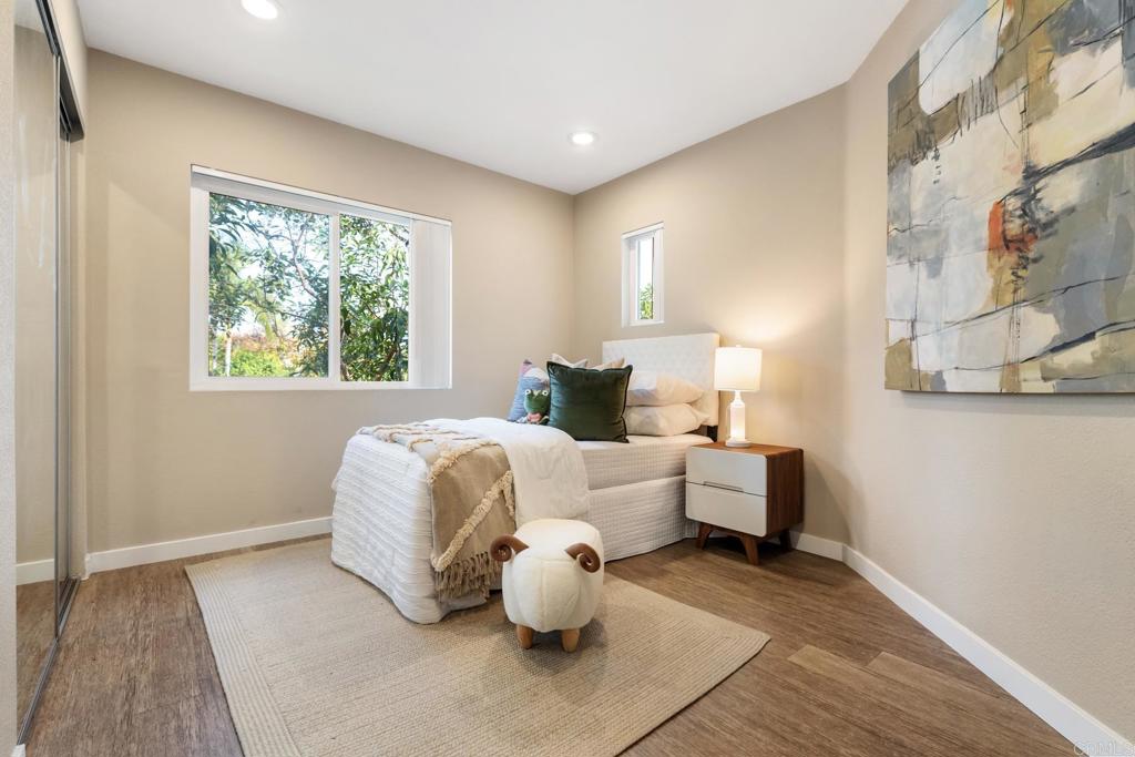 3215 Corte Poco Carlsbad, CA 92009 - Photo 18 of 25 a bedroom with bed and window