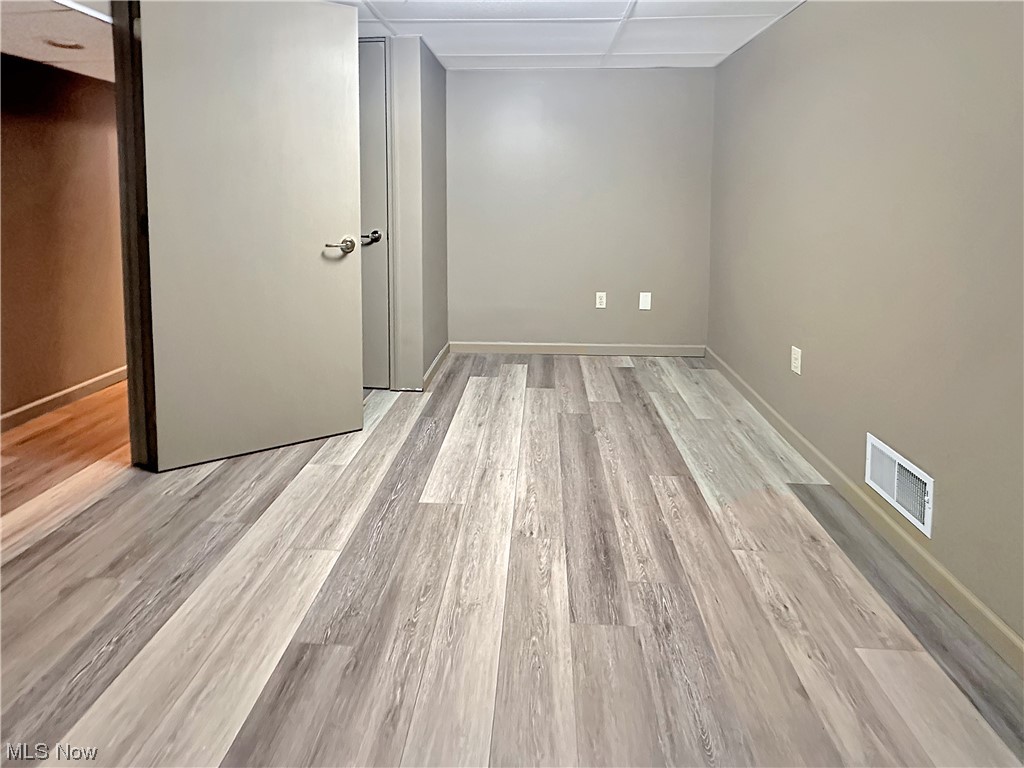 2692 Race Track Road New Cumberland, WV 26047 - Photo 19 of 25 Unfurnished room with light wood-type flooring