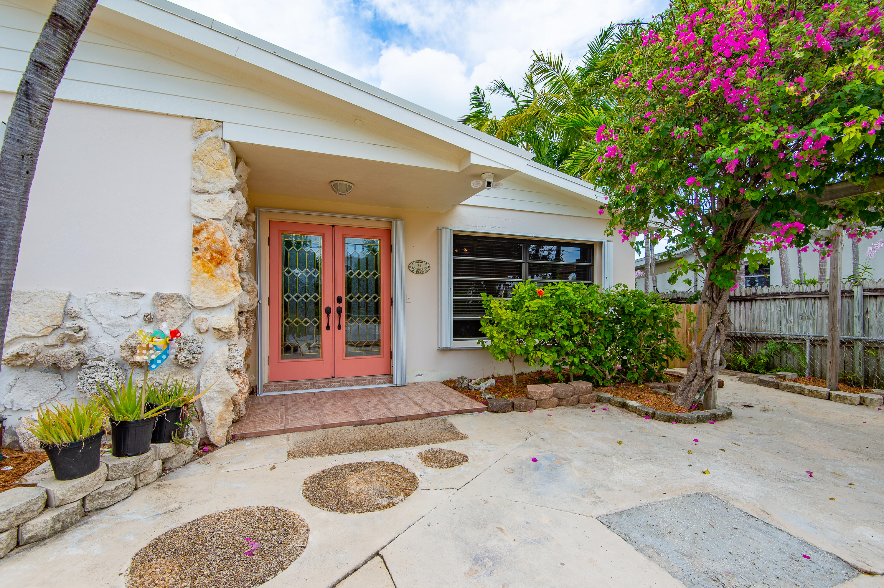 34 Key Haven Road Key West, FL 33040 - Photo 12 of 45 a front view of a house with plants