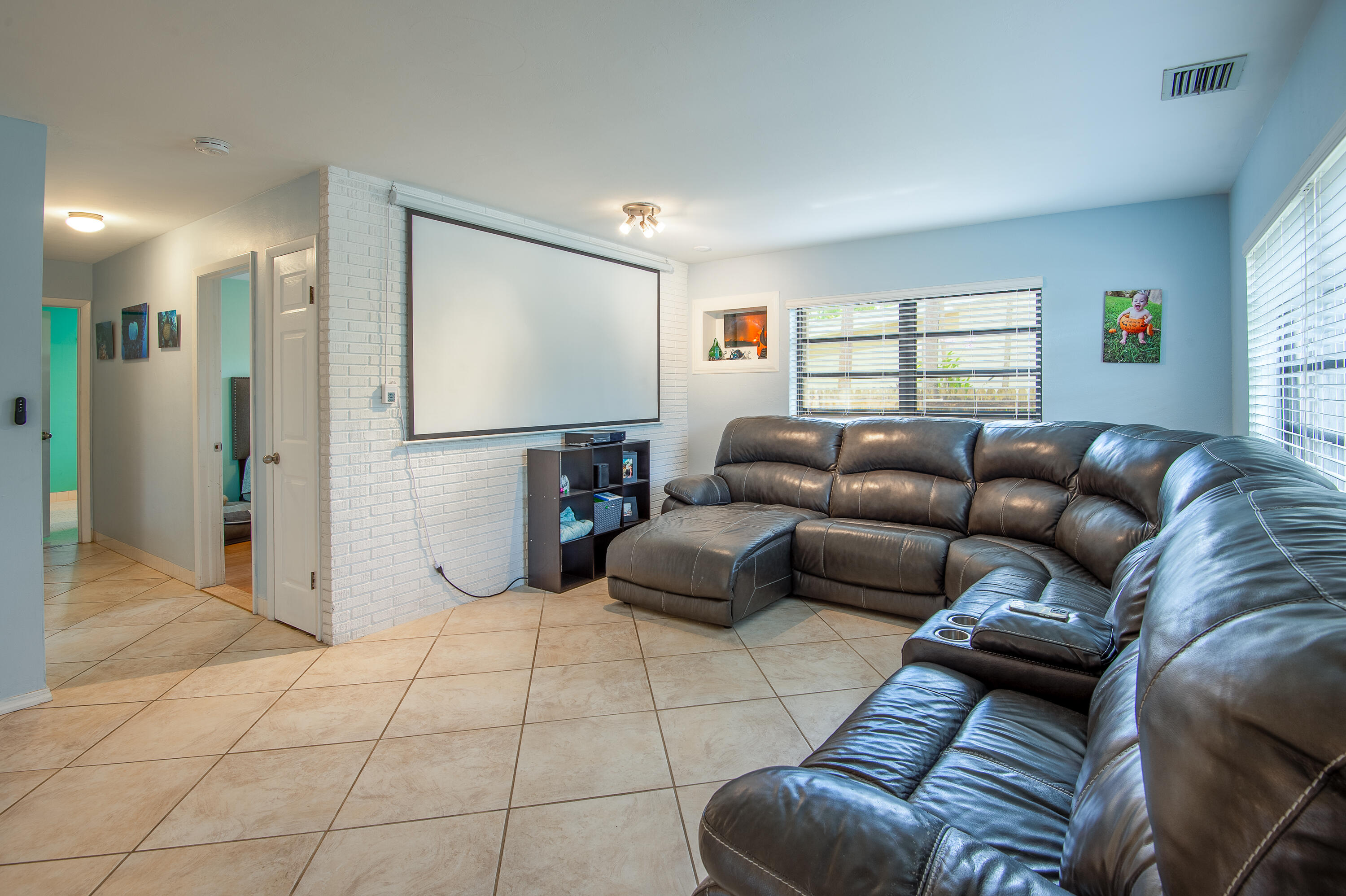 34 Key Haven Road Key West, FL 33040 - Photo 14 of 45 a living room with furniture and a flat screen tv