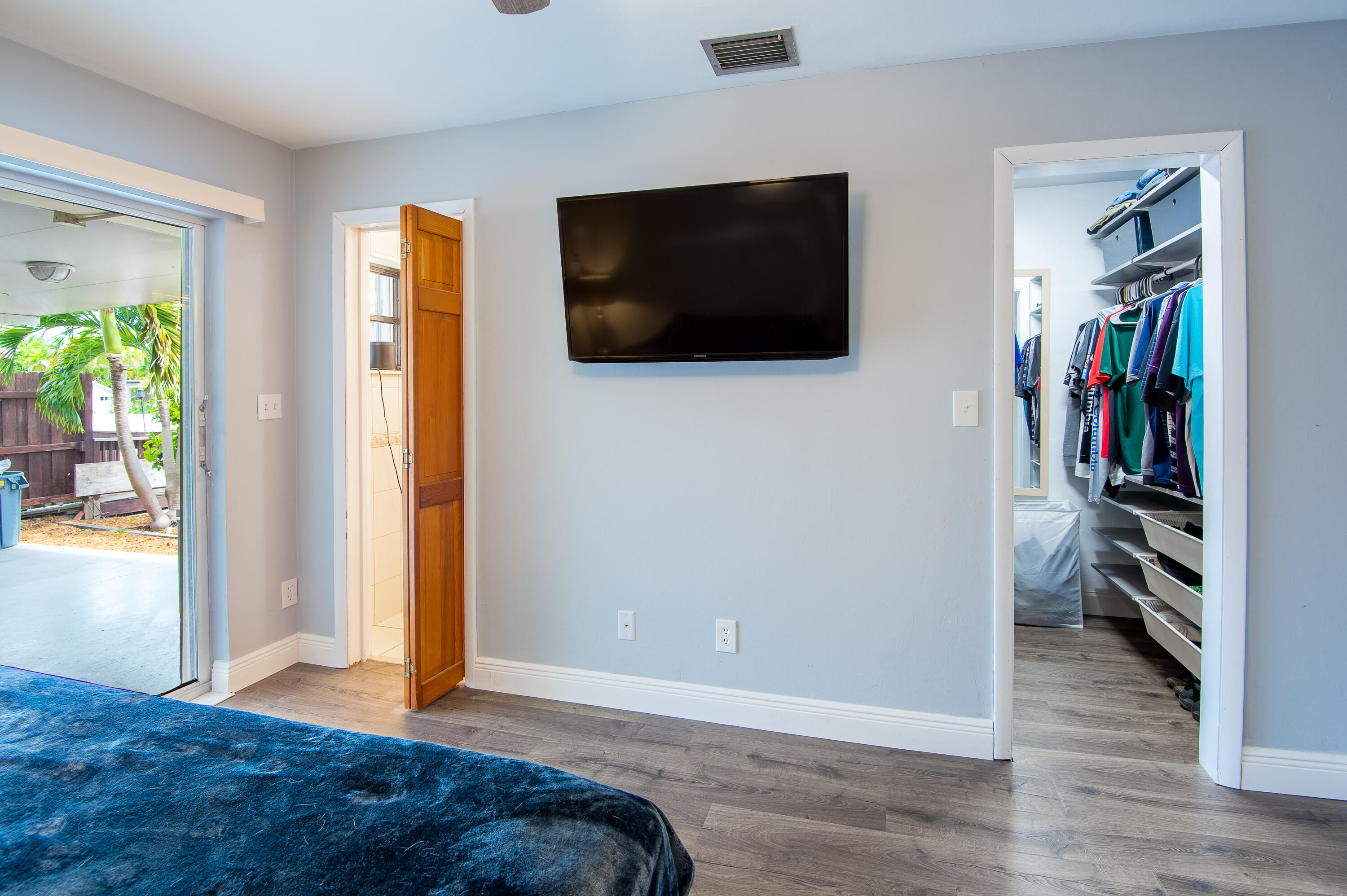 34 Key Haven Road Key West, FL 33040 - Photo 25 of 45 a bedroom with a bed and a flat screen tv