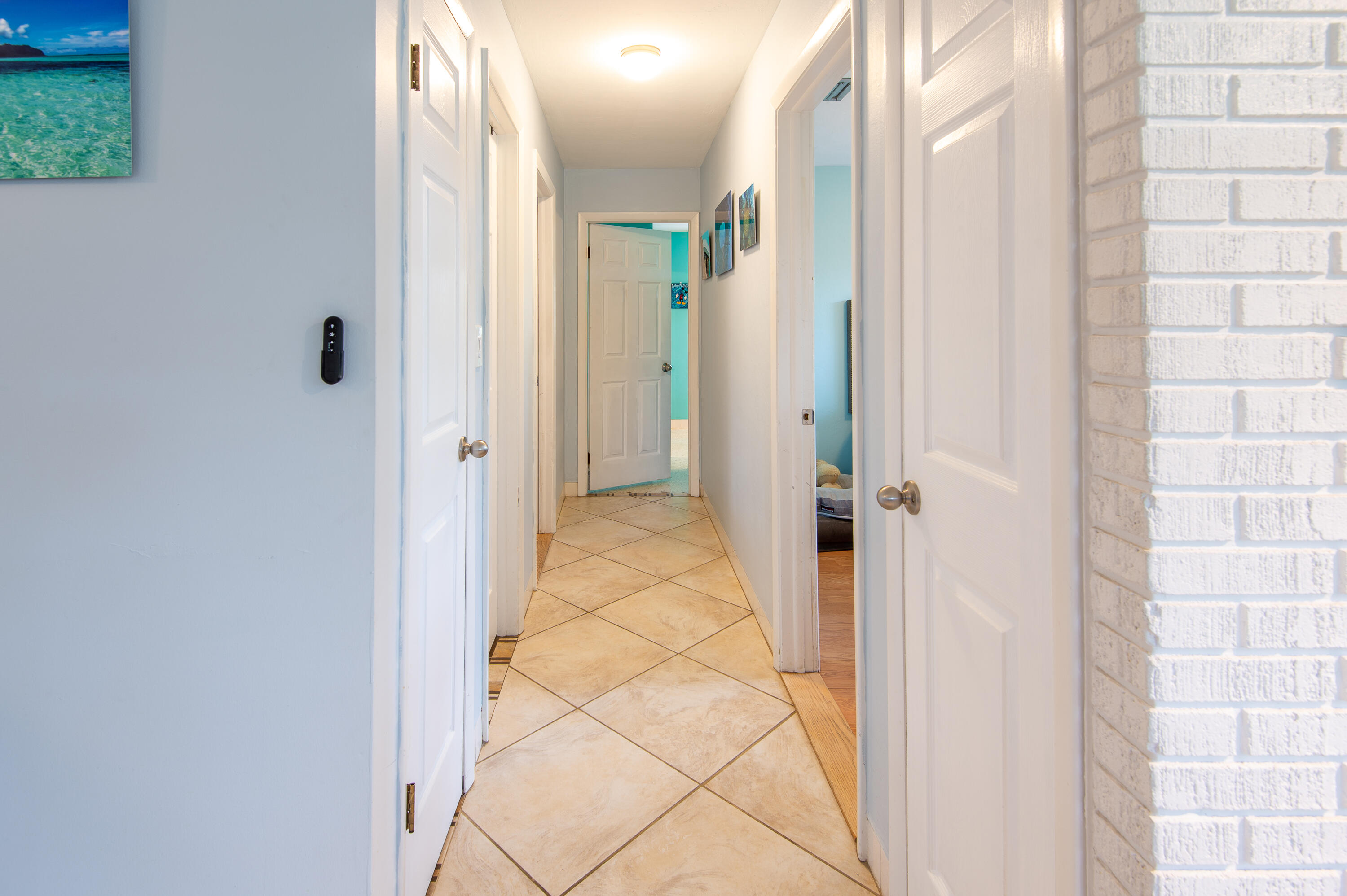 34 Key Haven Road Key West, FL 33040 - Photo 27 of 45 a view of a bathroom from a hallway