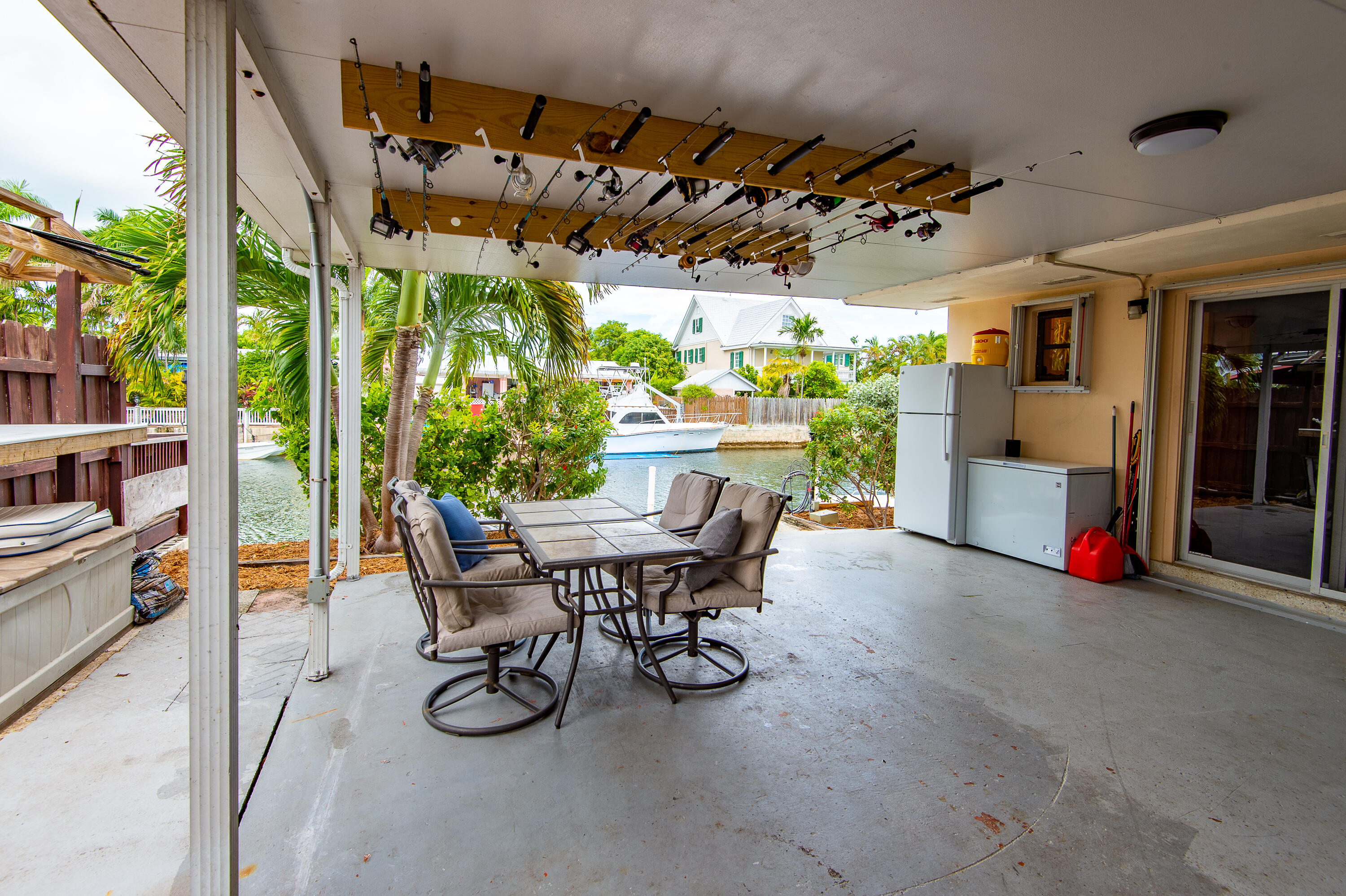 34 Key Haven Road Key West, FL 33040 - Photo 8 of 45 a view of an outdoor space with a table and chairs