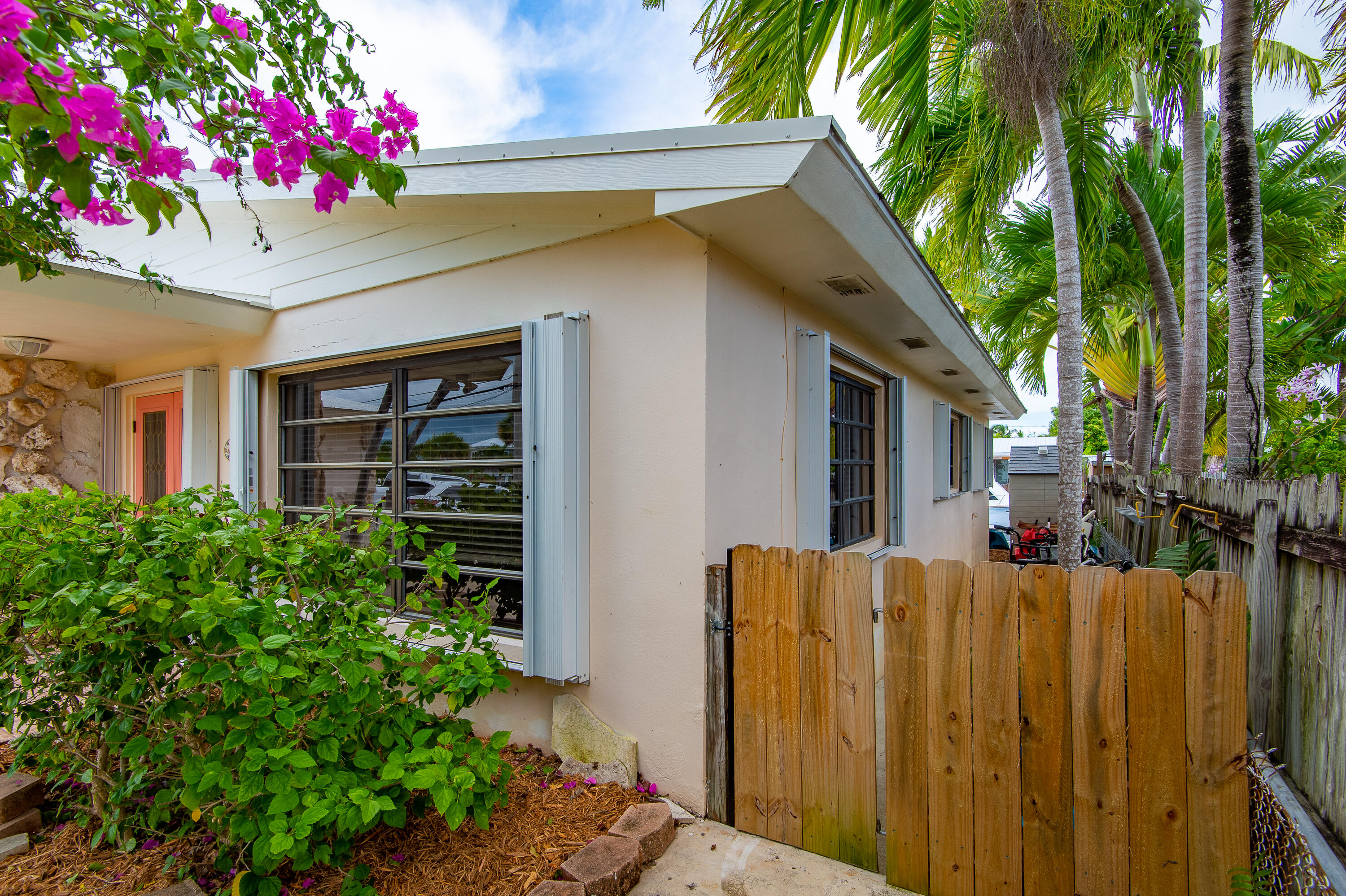 34 Key Haven Road Key West, FL 33040 - Photo 10 of 45 a front view of a house with a yard