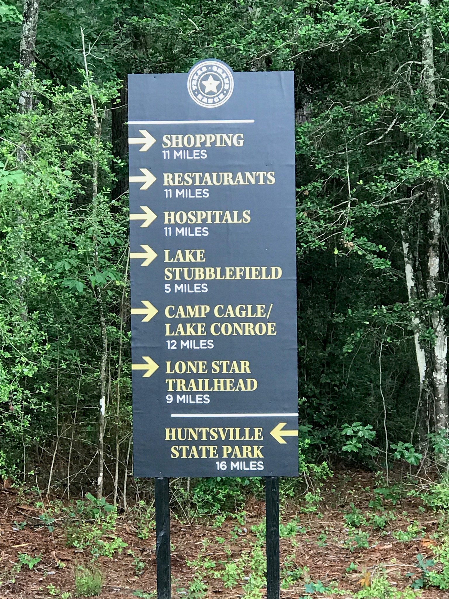 4-a-12-9 Red Hawk Road Huntsville, TX 77340 - Photo 17 of 29 a sign on the side of a road