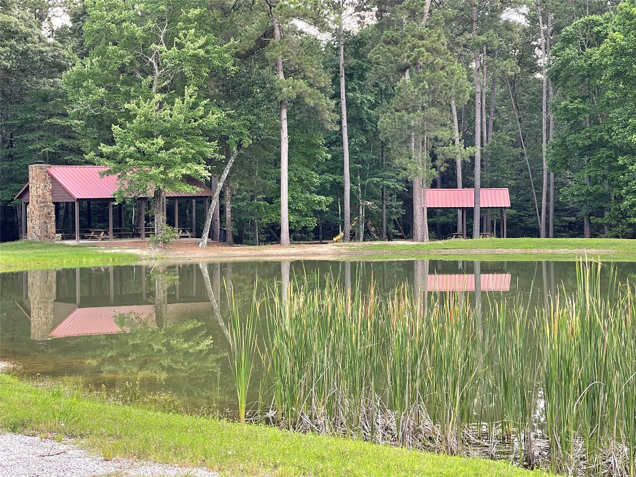 4-a-12-9 Red Hawk Road Huntsville, TX 77340 - Photo 18 of 29 a view of a swimming pool with a patio