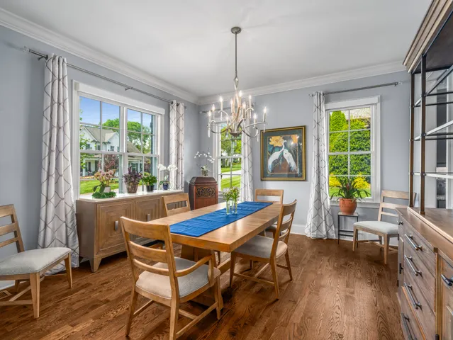 a room with furniture a air conditioner and a window